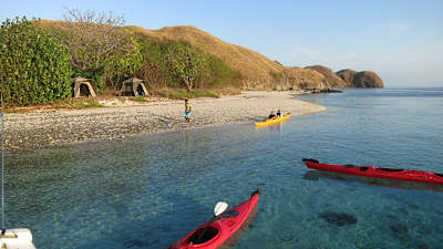 Kayaking as seen off the shores of Komodo Island in Indonesia.