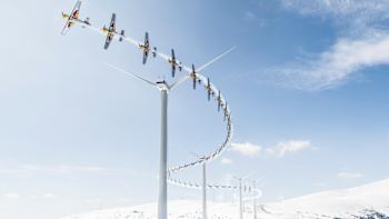 Sequence image of Hannes Arch slaloming through a series of wind turbines at the Tauernwindpark in Oberzeiring, Austria