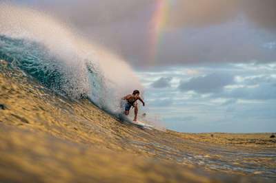 Kanoa Igarashi chasing rainbows in Coolangatta, Australia