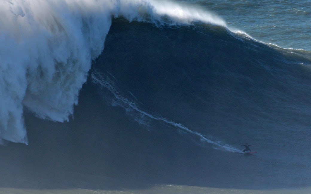 Justine Dupont Surfs Biggest Wave In Nazare Portugal