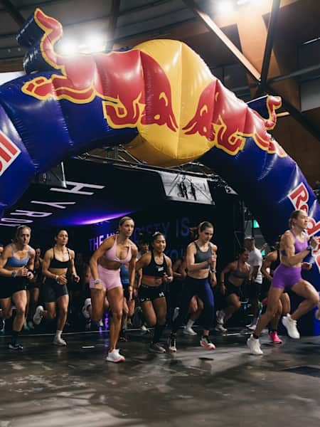 Women's Pro competitors take off under the Red Bull arch at Hyrox's Sydney event on July 27, 2024 