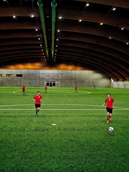 Players training inside The Red Bull Academy cutting-edge football training facility in Salzburg, Austria.
