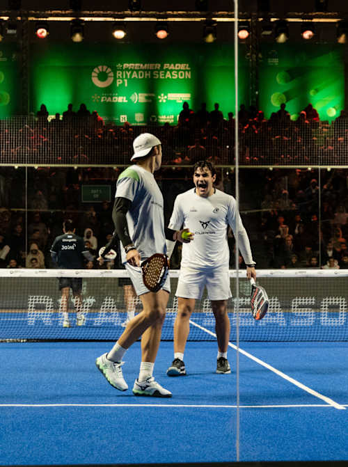 Pablo Cardona competes in the intense semi-finals at Riyadh Premier Padel P1 2025 in Saudi Arabia, with a vibrant crowd energising the action