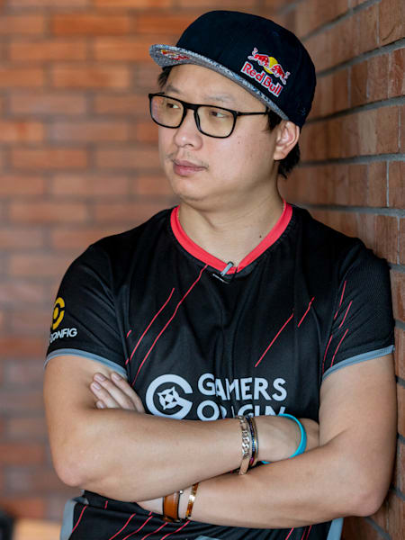 An image of Oliver 'Luffy' Hay against a wall