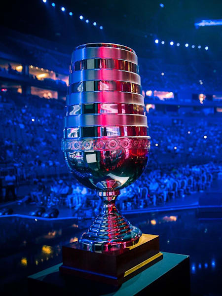 The ESL One trophy and an arena full of CS:GO fans.