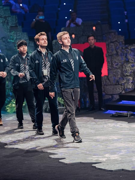 Team OG enter the Mercedes Benz arena in Shanghai to defend their TI title.