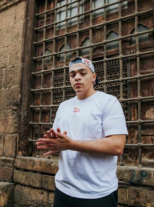 Ahmed Halawa poses for a portrait in Al Moez Ldin Allah Al Fatmi Street in Cairo, Egypt on February 2, 2024.