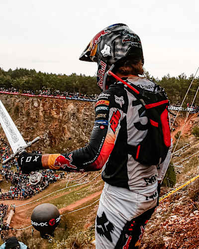 Mani Lettenbichler holds a sword in front of the 24MX Hixpania crowd 