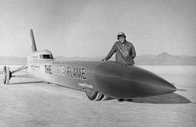 An image of Gary Gabelich standing by his car, the Blue Flame, in which he scored the outright land speed record at Bonneville Salt Flats, Utah, in 1970.
