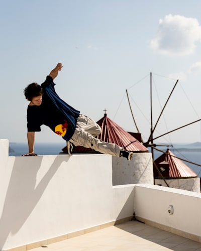 Freerunner Krystian Kowalewski performs on a rooftop on the isalnd of Astypalea, Greece.