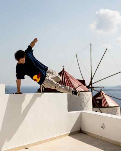 Freerunner Krystian Kowalewski performs on a rooftop on the isalnd of Astypalea, Greece.