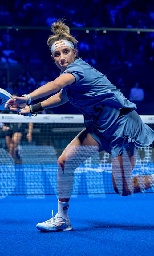 Beatriz González dives for a winning shot during the Premier Padel 2025 Finals semifinals in Barcelona, Spain, showcasing Red Bull's thrilling energy on court.
