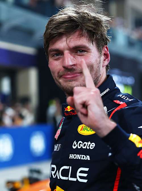 Max Verstappen celebrates in parc ferme during qualifying ahead of the F1 Grand Prix of Abu Dhabi at Yas Marina Circuit on December 6, 2025 in Abu Dhabi, United Arab Emirates. 