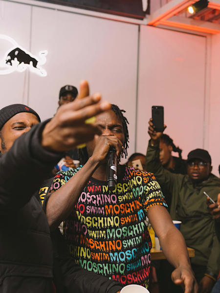 Naira Marley rocking the Moschino