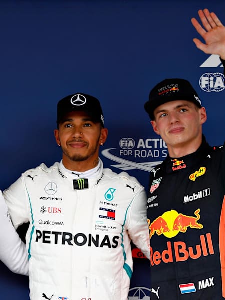 Top three qualifiers Hamilton and Mercedes GP, Bottas and Mercedes GP and Verstappen and Red Bull Racing celebrate in parc ferme during qualifying for the Formula One Grand Prix of Japan.