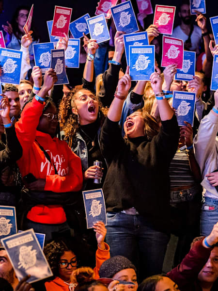 A lot of people present their voting cards at Red Bull Dance Your Style Brussels in 2018.