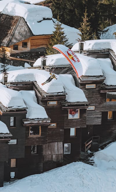 Valentin Delluc speedrides on rooftop in Avoriaz, France on March 23, 2021.