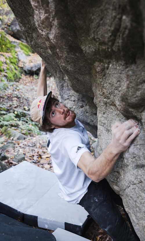 Giuliano Cameroni performs bouldering prior to the Red Bull Dual Ascent in Verzasca, Switzerland, on October 27, 2022.