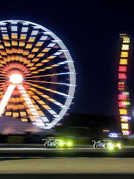 Cars race during the night stages of the Le Mans 24 Hours endurance race in Le Mans, France on June 17, 2017.