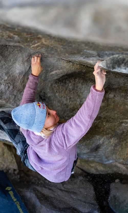 In November 2025, Janja Garnbret showcases her dynamic skills on rugged Ticino rock during the Red Bull Bouldering Camp, epitomising fearless adventure in Switzerland.