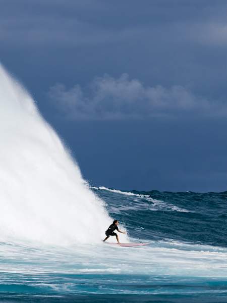 In 2024, Dominique Charrier surfing a massive wave at Red Bull Magnitude in Hawaii, USA