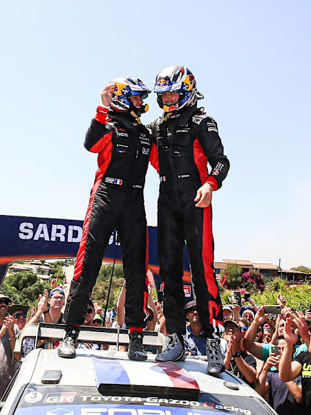 Ogier and Landais celebrate on the podium