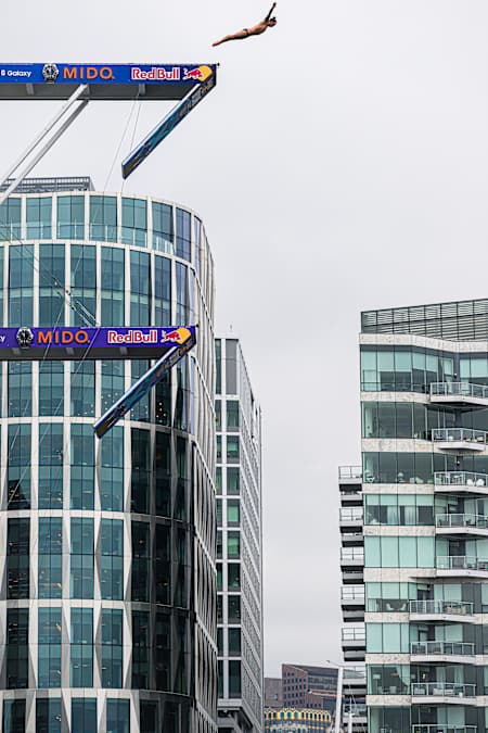 Nikita Fedotov, dives during the first competition day of the second stop of the 2024 Red Bull Cliff Diving World Series in Boston, USA on June 6, 2024. 