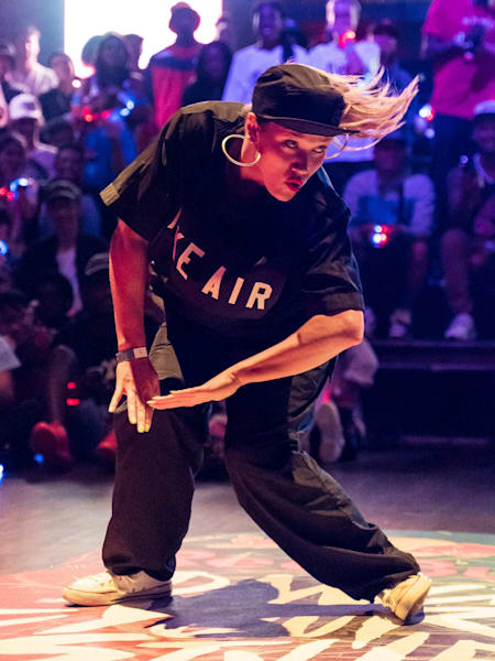 Lady C dancing with the crowd in the background