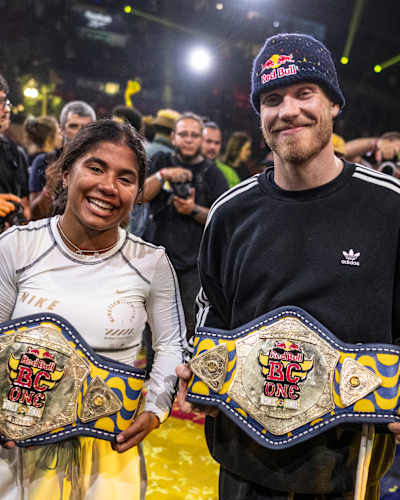 B-girl Indiaand B-boy Menno of the Netherlands celebrate with the winners belts during the Red Bull BC One World Final at Farmasi Arena, Rio de Janeiro, Brazil on December 7, 2024. 