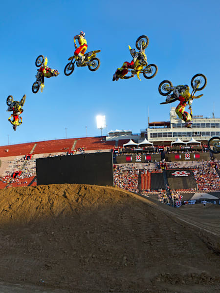 A photo of Travis Pastrana pulling off a double backflip in his 'lap of honour' third run after winning gold at the 2010 Summer X Games.