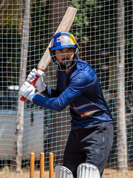 Indian cricket batsman KL Rahul pays a shot during a practice match.