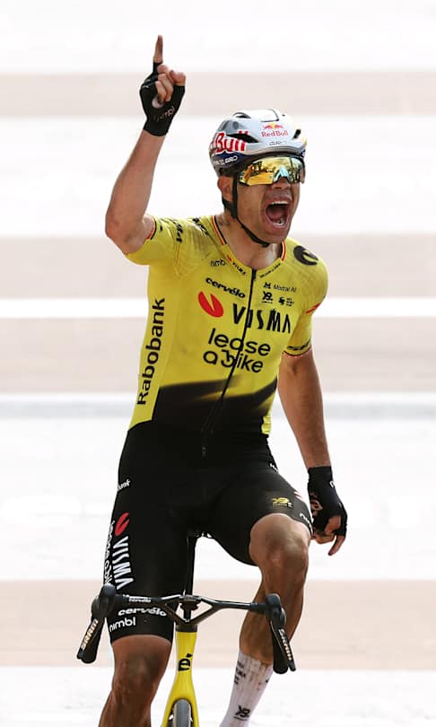 Wout van Aert celebrates at the finish line as race winner ahead of Tadej Pogacar at the 123rd Paris-Roubaix in 2026