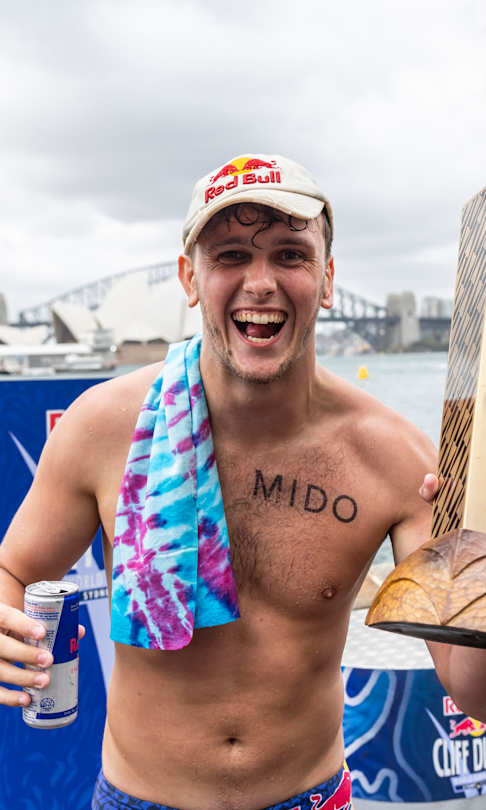 Aidan Heslop of the UK celebrates with the World Series trophy at the final stop of the Red Bull Cliff Diving World Series in Sydney, Australia on November 10, 2024. 