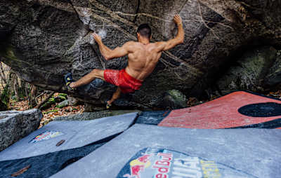 Alberto Gines Lopez climbs a boulder in Locarno, Switzerland on October 26th 2022.