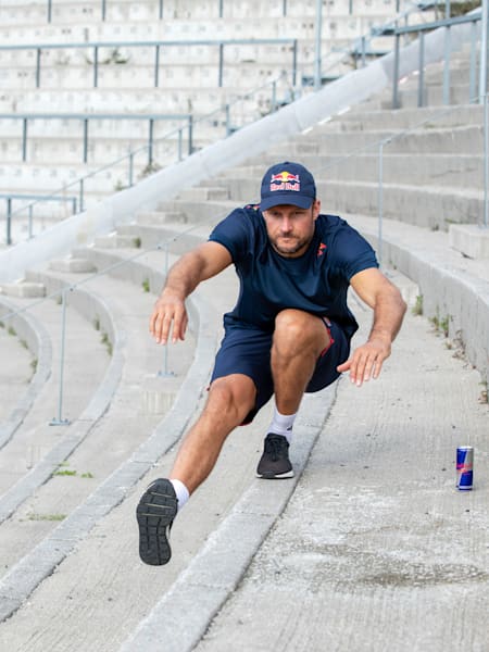 Norwegian alpine ski racer Aksel Lund Svindal performs a squat exercise.