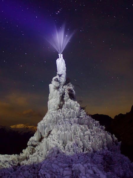 An image of a man-made ice structure in the Himalayas, made by the Ice Stupa Project.