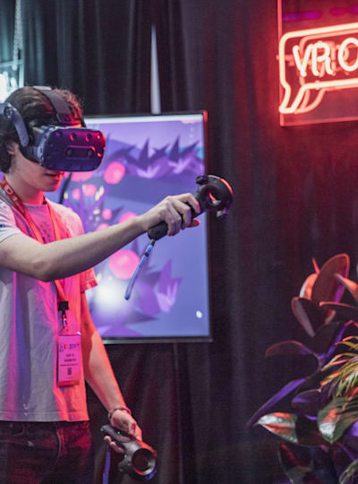 Participant playing VR games at E3 Expo