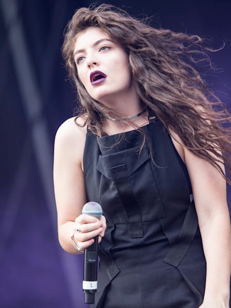 Lorde performing live.