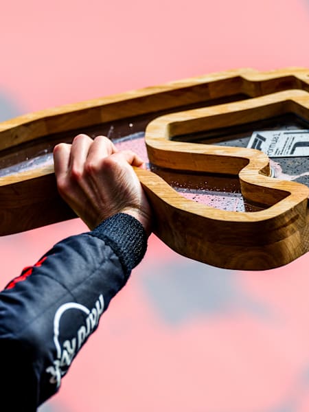 Max Verstappen of Red Bull Racing and The Netherlands with the winning trophy during the F1 Grand Prix of Belgium at Circuit de Spa-Francorchamps on August 28, 2022 in Spa, Belgium