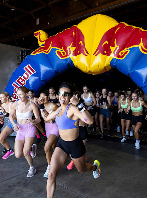 HYROX comepetitors start into the race under a Red Bull arch at a race in Auckland, New Zealand