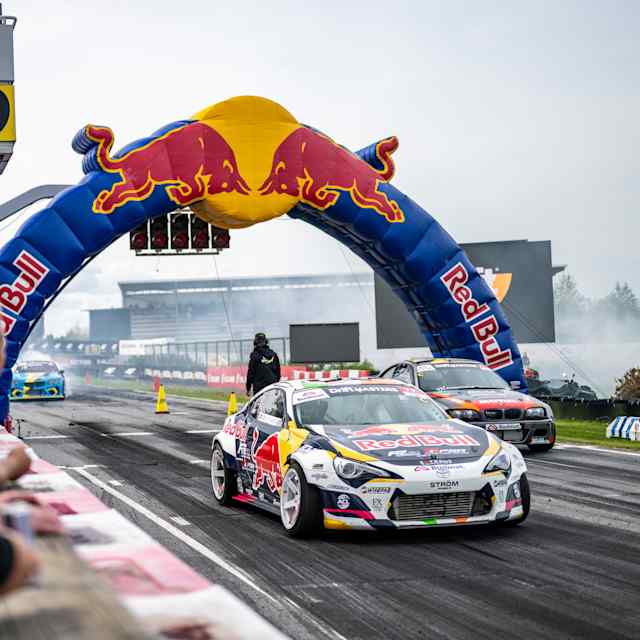 Conor Shanahan and Pontus Hartman ignite the track at Round 3 of 2025 Drift Masters in Alahärmä, Finland, under the iconic Red Bull archway