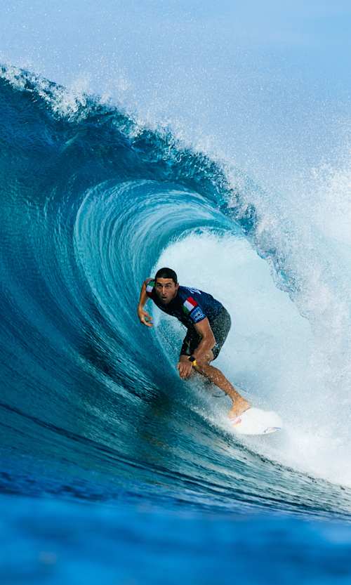 Leonardo Fioravanti of Italy carves through a massive barrel at the 2025 Lexus Pipe Pro, the World Surf League opener in Oʻahu, Hawaii