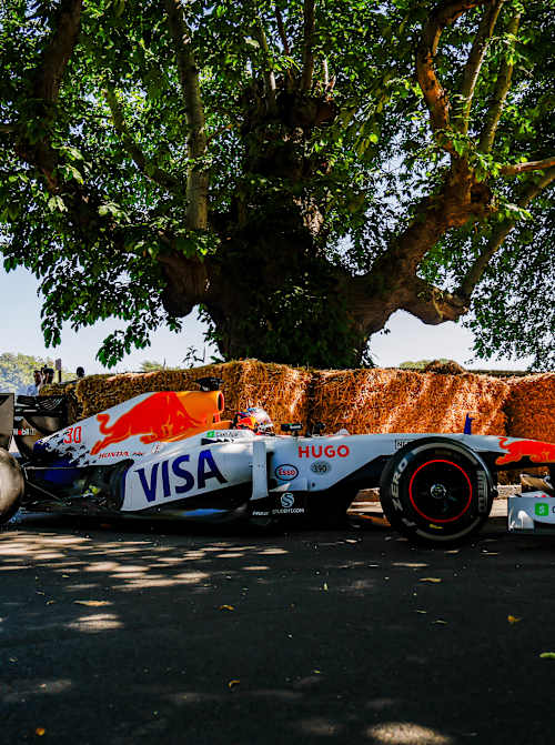 On July 13, 2025, Patrick Friesacher pilots the RB7 Formula One car at the Goodwood Festival of Speed in the UK