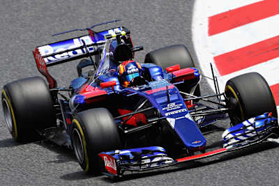 The 2017 Toro Rosso STR12 F! car being driven by team driver Carlos Sainz Jr.