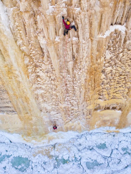 Angela VanWiermeersch leads Sasha DiGiulian up a mammoth ice face in Michigan, USA.