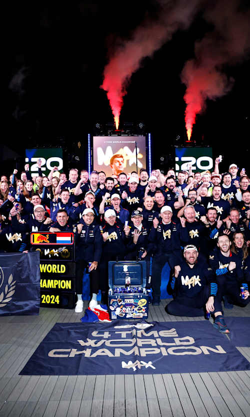 The Oracle Red Bull Racing team celebrate after Max Verstappen of the Netherlands is crowned 2024 F1 World Drivers Champion in the Paddock after the F1 Grand Prix of Las Vegas.