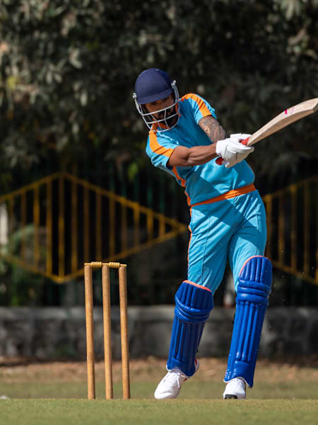 KL Rahul plays a shot while batting on a pitch.