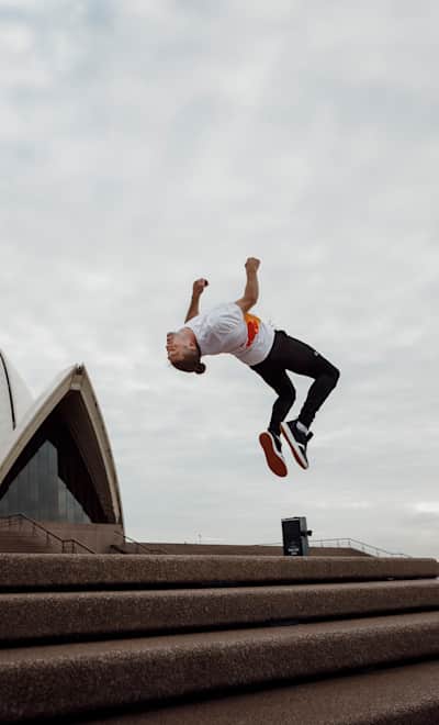 Parkour pro Dominic Di Tommaso jumps down 25-step stairway in Lyon