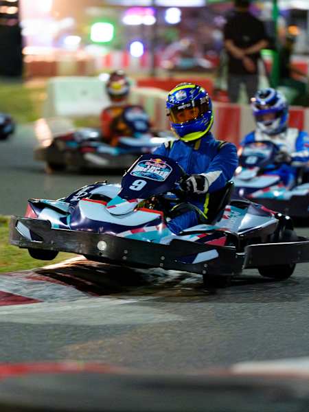 Participants compete in Red Bull Kart Fight 2024 as a driver in kart number 9 takes a corner at the Santo Domingo event in the Dominican Republic on 19 October 2024