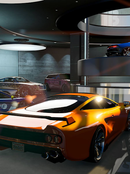 Coches en un garaje en el videojuego Grand Theft Auto 5.